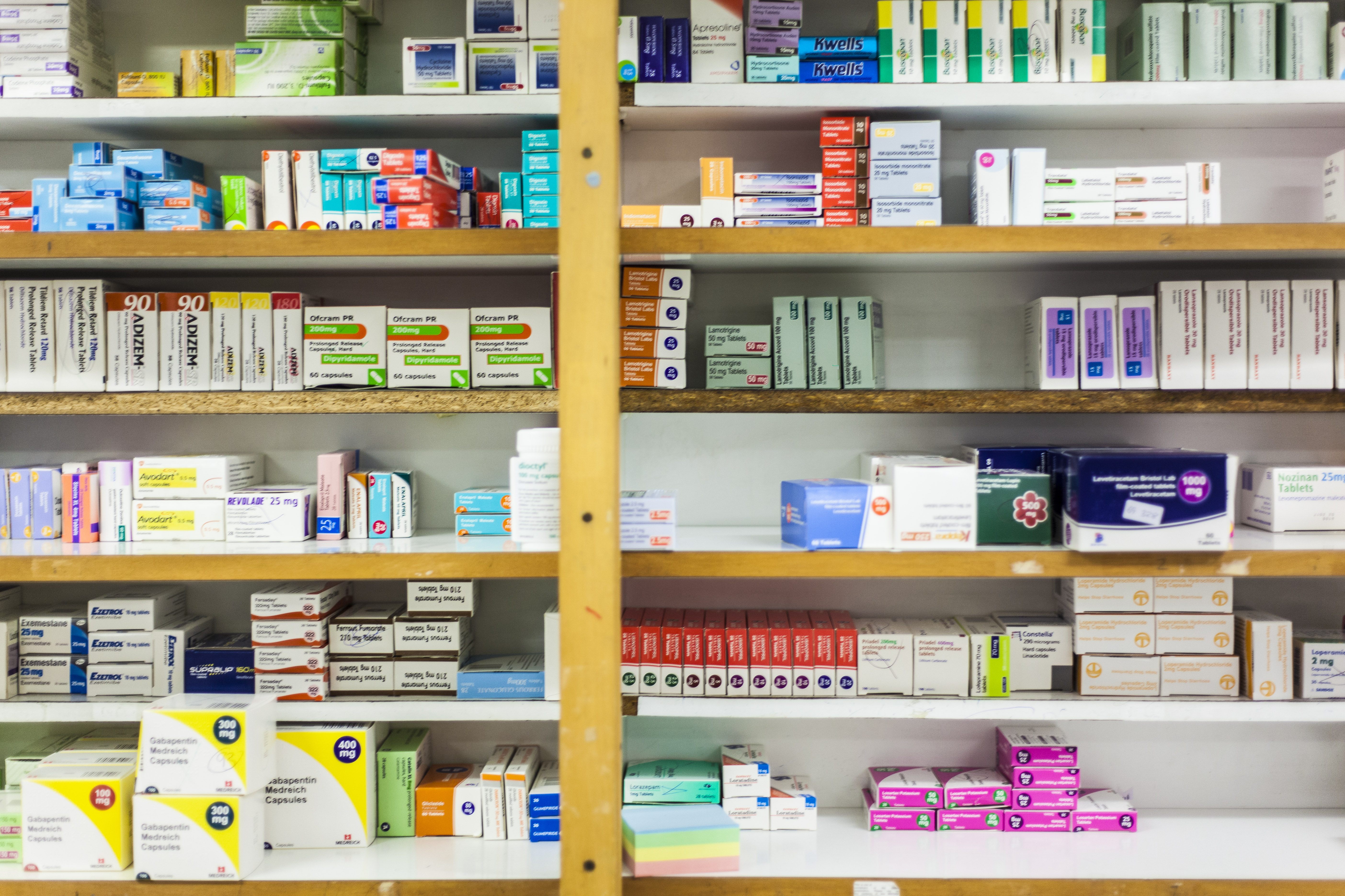 Stacks of medication boxes on shelves