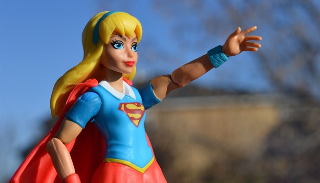 Plastic doll dressed as Superman