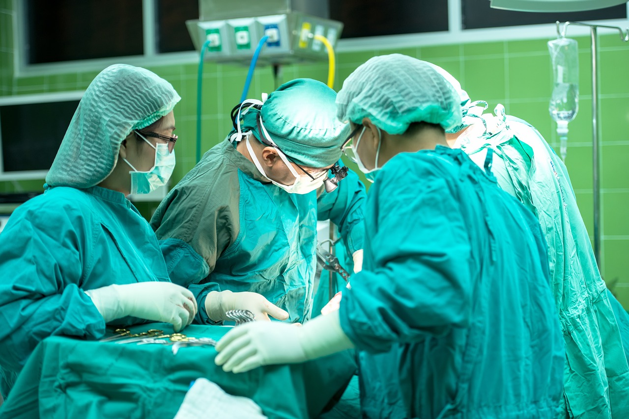 Surgeons in Green, performing surgery